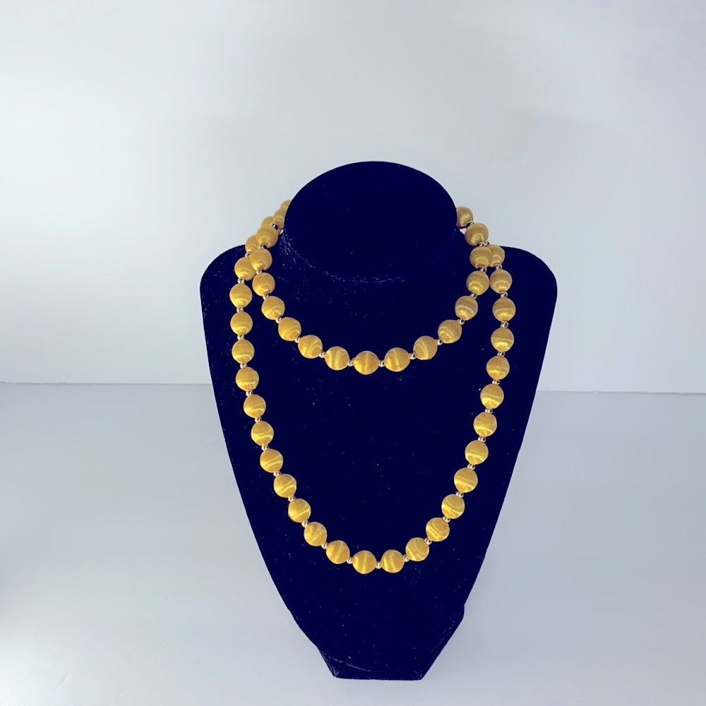 Vintage looking yellow threaded beaded necklace